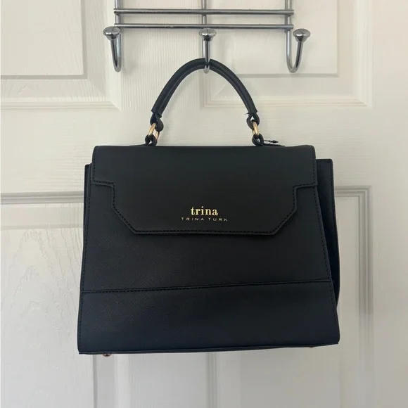 Sleek Sophisticated Trina Turk Black Handbag or Crossbody with Gold Hardware - Picture 4 of 11